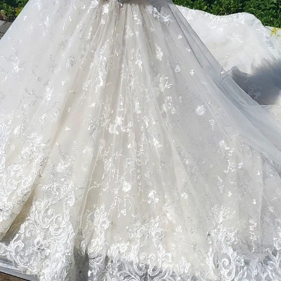 Eve of Milady Couture stunning wedding gown Train is approximately 6ft